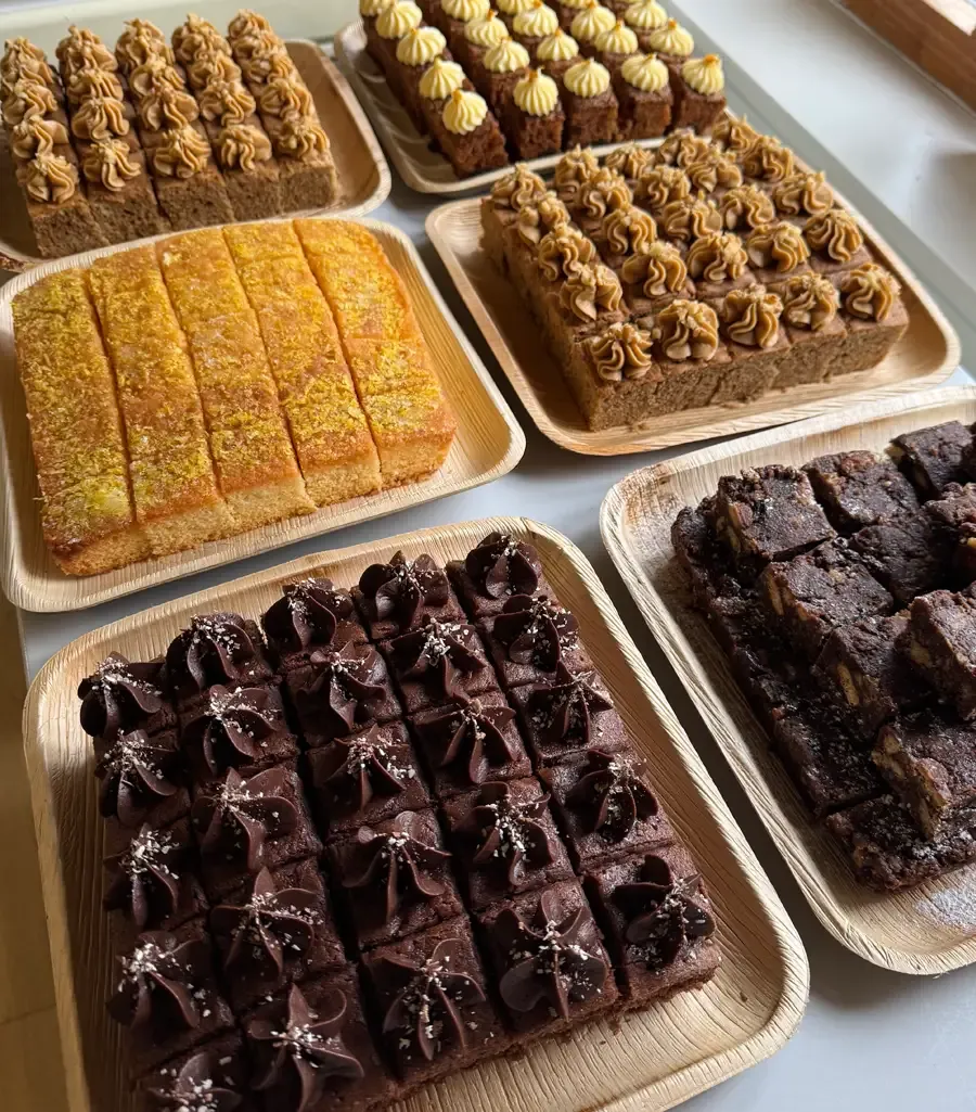 Plates of delicious freshly baked cakes